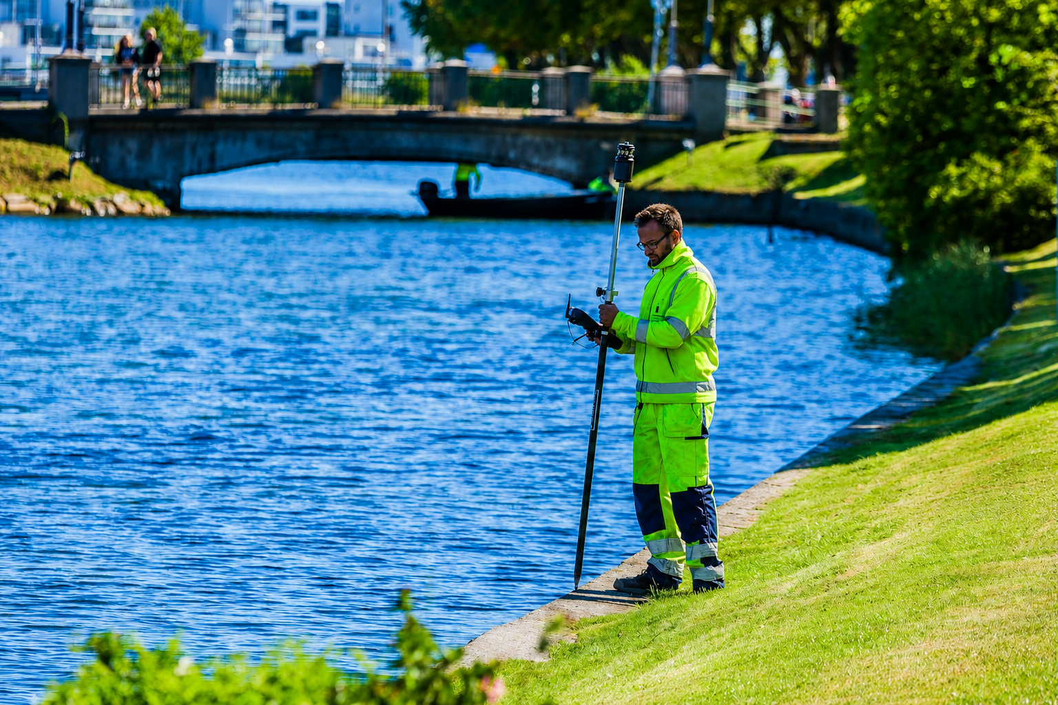 Survey team in field using GNSS equipment